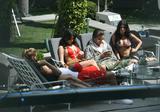 Kim Kardashian in bikini showign her big boobs while filming Keeping Up with the Kardashians reality show