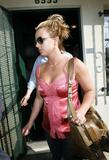 Britney Spears showing cleavage in pink top - shopping at Sunset Plaza in West Hollywood