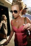 Britney Spears showing cleavage in pink top - shopping at Sunset Plaza in West Hollywood